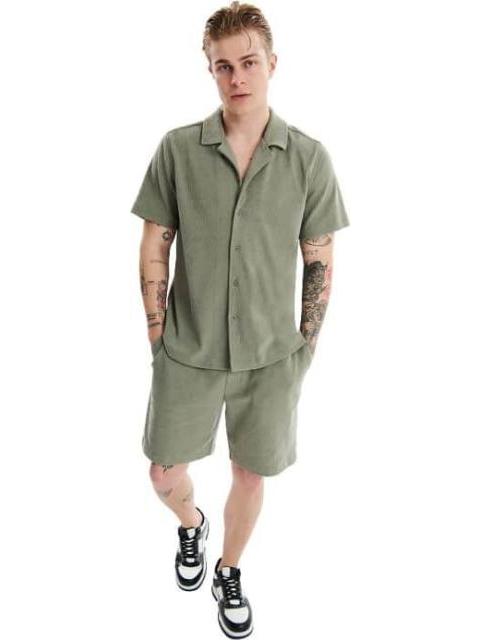 CAMISA MANGA CORTA VERDE OLIVO NEXT CO - Imagen 2