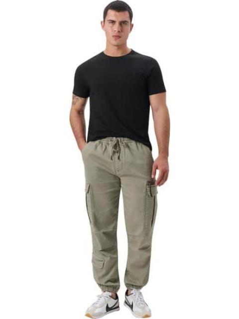 PANTALON JOGGER VERDE ARRIBA DE LA MONTANA