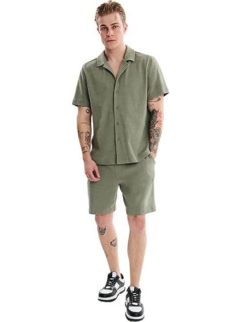 SHORT BASICO VERDE OLIVO NEXT CO