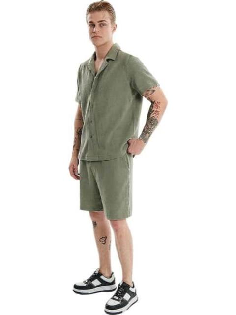 SHORT BASICO VERDE OLIVO NEXT CO - Imagen 3
